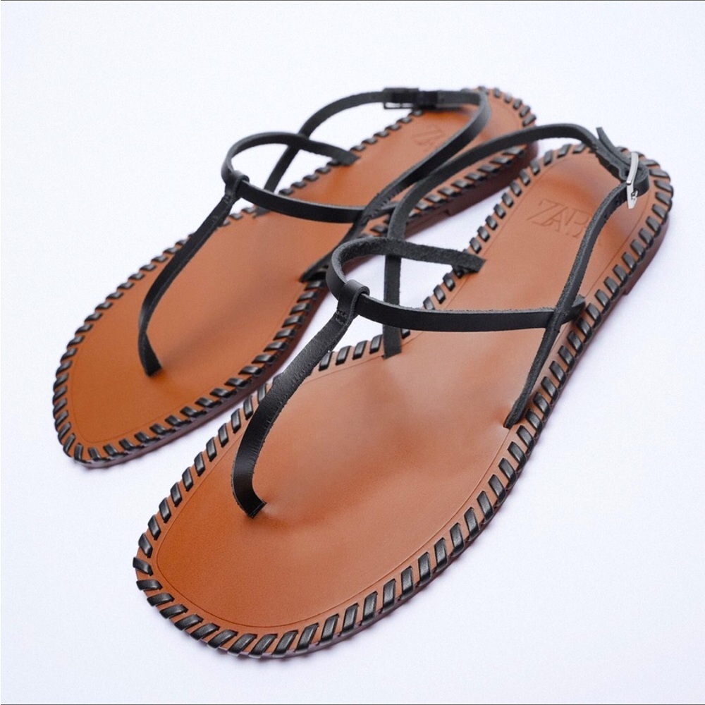 Zara T-strap leather flat sandals.
